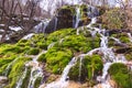 Amazing waterfall stream in forest, early spring. Nature landscape. Waterfall Siga. Homolje mountains Royalty Free Stock Photo