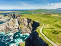 Amazing wave lashed Kerry Cliffs, the most spectacular cliffs in County Kerry, Ireland. Tourist attractions on famous Ring of