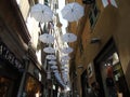 An amazing white umbrellas decoration over the city of Genova