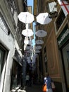 An amazing white umbrellas decoration over the city of Genova