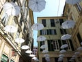 An amazing white umbrellas decoration over the city of Genova