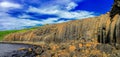 Amazing wide basalt like waterfalls, cirrus clouds Royalty Free Stock Photo