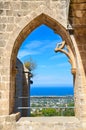 Amazing window view from the ruins of historical Bellapais Abbey in Cypriot Kyrenia region. The beautiful monastery is overlooking