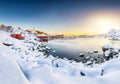 Amazing winter scenery of Moskenes village with ferryport and famous Moskenes parish Churc