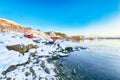 Amazing winter scenery of Moskenes village with ferryport and famous Moskenes parish Churc