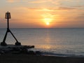 Amazing winter sunset on eastbourne beach Royalty Free Stock Photo