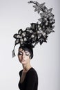 Amazing Woman in Trendy Headwear with Flowers