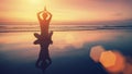 Amazing yoga background, silhouette of woman on the beach at beautiful sunset Royalty Free Stock Photo