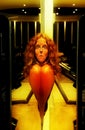 Impressive scary redhead woman portrait, creepy face reflection in mirror