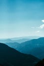 Amazingly peaceful shot of an endless mountain range layers gradually fading out