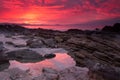 Amazingly Vivid Sunset Lights Up Ocean and Rock Pools