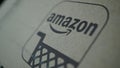 Amazon box detail with logo, smile and stylized shopping cart