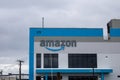 Amazon building with a blue canopy on display. Royalty Free Stock Photo