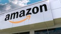 Amazon.com logo on the modern building facade. Editorial 3D rendering