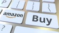 AMAZON company logo and Buy text on the keys of the computer keyboard, editorial conceptual 3D rendering