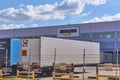 Amazon distribution center with rental trailer parked in front of the modern warehouse, logistics hub and e-commerce supply chain Royalty Free Stock Photo