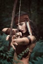 Amazon huntress aiming with bow Royalty Free Stock Photo