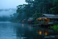 Amazon jungle camp by the water. Generative AI