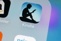 Amazon Kindle application icon on Apple iPhone X screen close-up. Amazon Kindle app icon. Amazon kindle application. Social media Royalty Free Stock Photo