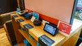 An Amazon Kindle Paperwhite, Fire, Alexa Echo Dot, and Echo Show 5 for sale an Amazon Bookstore