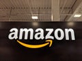 Amazon logo on black shiny wall in Honolulu Best Buy store Royalty Free Stock Photo