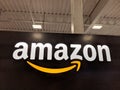 Amazon logo on black shiny wall in Honolulu Best Buy store Royalty Free Stock Photo