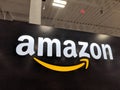 Amazon logo on black shiny wall in Honolulu Best Buy store Royalty Free Stock Photo