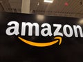 Amazon logo on black shiny wall in Honolulu Best Buy store Royalty Free Stock Photo