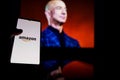 Amazon logo on screen and Jeff Bezos is a Executive Chairman of Amazon in background