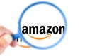 Amazon logotype enlarged with a magnifying glass