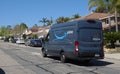 Amazon Prime delivery van out on deliveries in suburban neighborhood. Photo taken in Carlsbad, CA / USA - April 15, 2020. Royalty Free Stock Photo