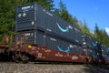 Amazon Prime intermodal container freight on BNSF train in rural area Royalty Free Stock Photo