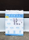 Amazon prime package left exposed at front door Royalty Free Stock Photo