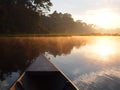 Amazon rainforest sunrise by boat Royalty Free Stock Photo