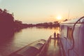 Amazon rainforest sunset during a boat trip with a reflection of the trees in the water. Puerto Francisco de Orellana. Ecuador. Royalty Free Stock Photo