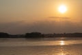 Amazon rainforest sunset during a boat trip with a reflection of the trees in the water. Puerto Francisco de Orellana. Ecuador. Royalty Free Stock Photo