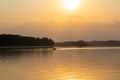 Amazon rainforest sunset during a boat trip with a reflection of the trees in the water. Puerto Francisco de Orellana. Ecuador. Royalty Free Stock Photo