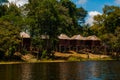 Amazon river, Manaus, Amazonas, Brazil: Amazon landscape with beautiful views. Wooden houses on an island on the Amazon river in