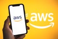 Amazon Web Services logo on the smartphone screen. Royalty Free Stock Photo