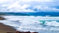Amban beach with waves and long coastline Royalty Free Stock Photo