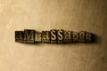 AMBASSADOR - close-up of grungy vintage typeset word on metal backdrop