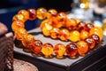 Amber Beads in a Street Shop, Baltic Sea Souvenir, Natural Jewelry, Gold Brown Stone Necklace Royalty Free Stock Photo