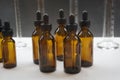 Amber bottle with droppers or dropping bottles. Scientific laboratory glassware.