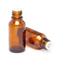 Amber color small glass bottle with pin hole dropper Royalty Free Stock Photo