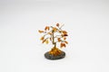 Amber decorative tree on white background Royalty Free Stock Photo