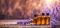 Amber Glass Essential Oil Bottles With Lavender Flowers In Warm Rustic Setting Royalty Free Stock Photo