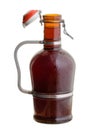 Amber glass German growler jug filled with beer