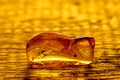 Amber with inclusions Royalty Free Stock Photo