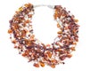 Amber necklace isolated on white background. Female accessories, decorative ornaments and jewelry.