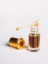 Amber oil bottle. Traditional Arabic incense oil. Royalty Free Stock Photo